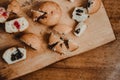 Yummy muffins with chocolate and berry filling on a cutting board Royalty Free Stock Photo