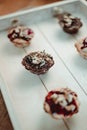 Yummy muffins with chocolate and berry syrup