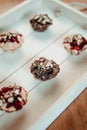 Yummy muffins with chocolate and berry syrup