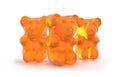 Gummy bears candy. Delicious, chewy jelly orange bears. Yummy gelatin candy. 3D rendering. Isolated on white background. Royalty Free Stock Photo