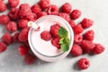 Yummy raspberry smoothie in jar and fresh berries on table, flat lay Royalty Free Stock Photo