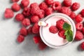 Yummy raspberry smoothie in jar and fresh berries on table, flat lay Royalty Free Stock Photo