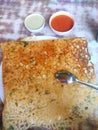 Yummy tastey rava dosa with coconut chutney and tomato chutney and south Indian sambhar Royalty Free Stock Photo