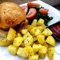 Veggie burgers with fries and salad