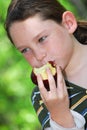 Yung girl eating apple Royalty Free Stock Photo