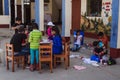 Yungay, Peru, August 8, 2014: school playground with group of boys and girls playing making crafts of many kinds
