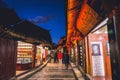 YUNNAN,CHINA 14 february 2022 - night scenic view of narrow street with souvenir shops in the Old Town of Lijiang