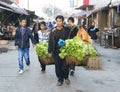 Vendor selling fresh vegetable in the street.