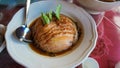 Yunnan tea leaf pork knuckle. Pig stewed in stewed soup. Stewed pork leg in gravy soup,High angle view of food served in plate on Royalty Free Stock Photo