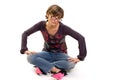 Yuppie girl sitting on the floor Royalty Free Stock Photo