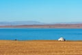 Yurt of Mongolian nomad camp on the shore of a lake