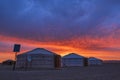 Early Morning View of Traditional Yurt mongolian family in Mongolia landscape Gobi Desert at sunrise.