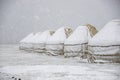 Yurt under the snow in the middle of a snow-covered field. travel Kyrgyzstan Royalty Free Stock Photo