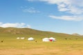 Yurts and Horses in Mongolian Steppe