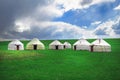 Yurts at Song Kol lake in Kyrgyzstan mountains.