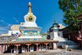 Tibetan pilgrims circle the Pagoda in YUSHU (JYEKUNDO), CHINA.