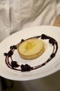 Yuzu Tart with Blueberry Reduction