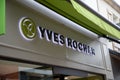 Yves Rocher logo text green sign brand facade store boutique entrance shop brand wall