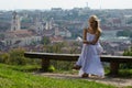 Young woman reading book in Vilnius, Lithuania