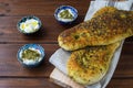 Za`atar bread, a lebanese or turkish or arabic bread made with sumac, sesame seeds olive oil served with labneh or labane on top