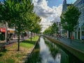 Trees grow along the canal in Zaandam