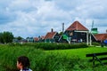 Zaanse Schans, Holland, August 2019. Northeast Amsterdam is a small community located on the Zaan River. View between the pretty Royalty Free Stock Photo