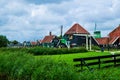 Zaanse Schans, Holland, August 2019. Northeast Amsterdam is a small community located on the Zaan River. View between the pretty Royalty Free Stock Photo