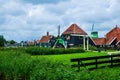 Zaanse Schans, Holland, August 2019. Northeast Amsterdam is a small community located on the Zaan River. View between the pretty Royalty Free Stock Photo