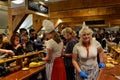 Zaanse Schans, Holland, August 2019. Tasting of typical Dutch cheeses: along the counter there are saucers with cubes of cheese to