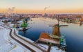 Zaanse Schans Netherlands a Dutch windmill village during sunset whit wooden house holland