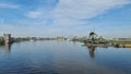 Zaanse Schans rural windmills, fields and river landscape Royalty Free Stock Photo