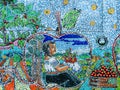 ZACATLAN PUEBLA, MEXICO - OCTOBER 01, 2017: A prehispanic mural of a woman selling apples.