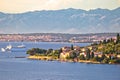 Zadar archipelago. Small island of Osljak and city of Zadar view