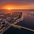 Zadar, Croatia - Aerial panoramic view of the old town of Zadar with colorful dramatic sunset sky, illuminated City Bridge Royalty Free Stock Photo