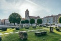 Zadar, Croatia - Aug 13, 2020: St. Mary's church at old town square roman relic stone in morning