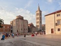 Zadar, Croatia - July 27, 2021: Church of St. Donatus and Bell tower. A square full of tourists