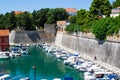 Zadar, Croatia; 07/17/2019: Lucica Fosa Zadar harbour full of boats and walls of the city in the old town of Zadar Royalty Free Stock Photo