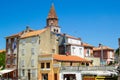 Zadar, Croatia; 07/17/2019: Typical croatian buildings with a tower on the top in Five Wells Square, in the old town of Zadar
