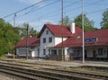 Zadni Treban, Czech republic, May 8, 2020: railway station Zadni Treban with white red roof building, track, trains and
