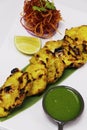 Zafrani chicken tikka, saffron and yoghurt marinated spiced tandoori tender chicken cubes cooked in clay oven, indian traditional