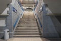 Stairs leading from the tunnel to the railway platform.