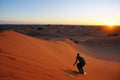 Zagora desert, sandboarding, sandboard, holiday, M` Hammid, Morocco, Africa, desert tour, camel tour, sand dunes Royalty Free Stock Photo