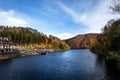 Autumnal landscape with Bystrzyckie lake and Maria Antonina hotel building, Poland. Royalty Free Stock Photo