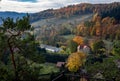 Autumnal mountain landscape in the Owl Mountains, Poland.Â Michalkowa village, colourful foliage on the trees. Royalty Free Stock Photo