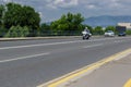 Croatian police, motorcycle and cars driving on the road