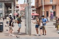 Group of young tourists looking at a map, trying to orientate themselves, lost, in the city center of Zagreb, Croatia Royalty Free Stock Photo