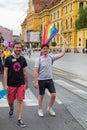 15th Zagreb pride. LGBTIQ activist holding flag.