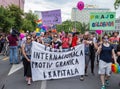15th Zagreb pride. LGBTIQ activists holding pride banner.