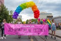 15th Zagreb pride. LGBTIQ activists holding pride banner.