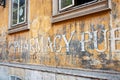 Old dilapidated signs on uncared for wall with word Pharmacy Royalty Free Stock Photo